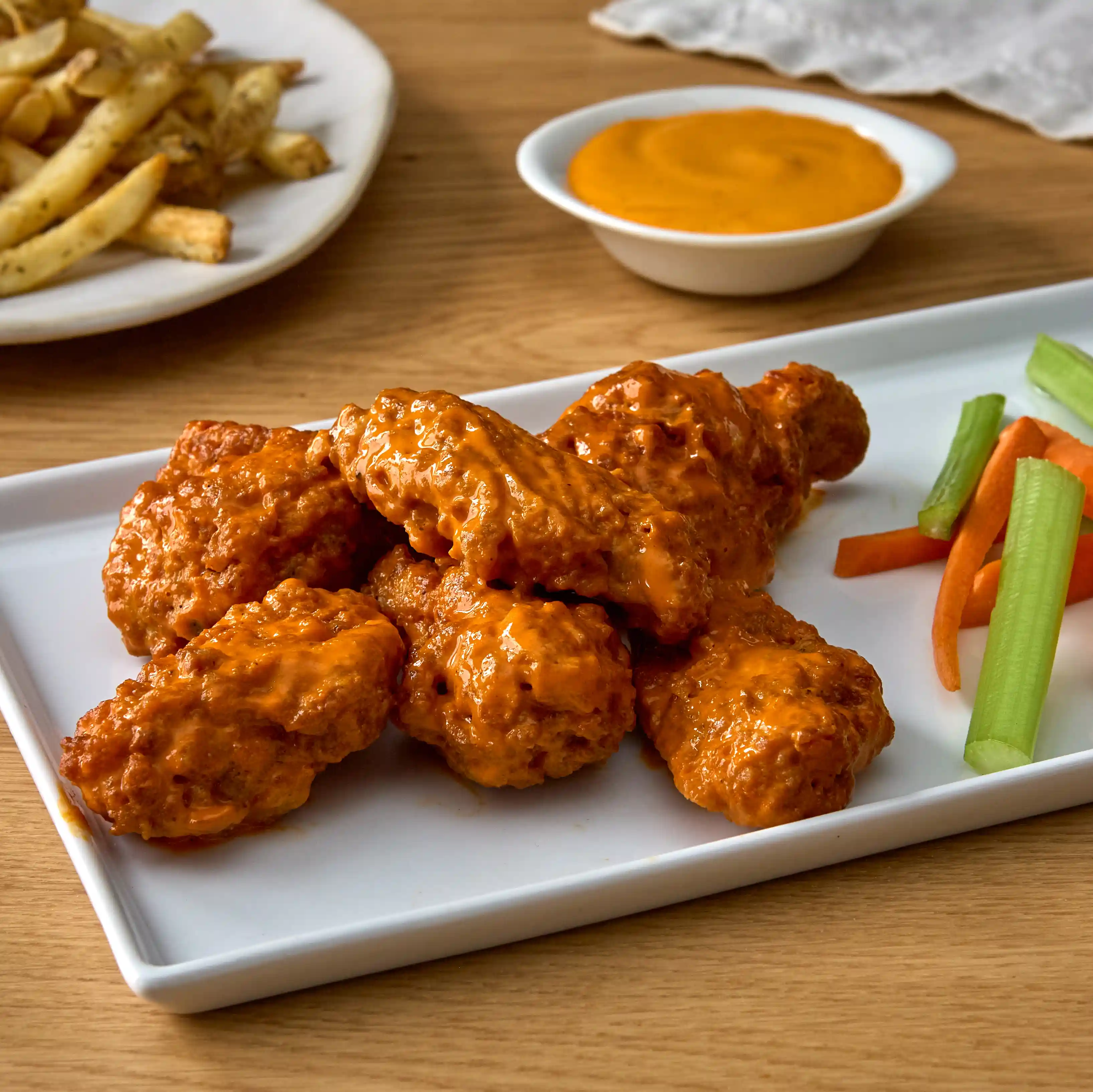 Tyson® W.W. Flyers® Fully Cooked Breaded Hot & Spicy Bone-In Chicken Wing Sections, Small https://images.salsify.com/image/upload/s--RHfJqLgD--/q_25/wnvrodscaarjd9mpy6qf.webp