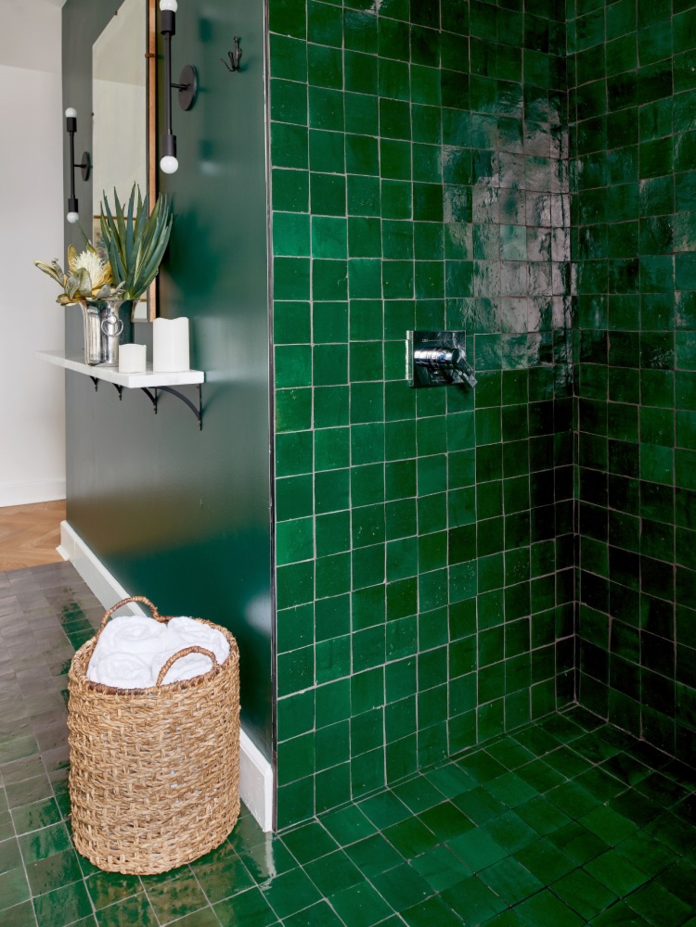 a green tiled shower.