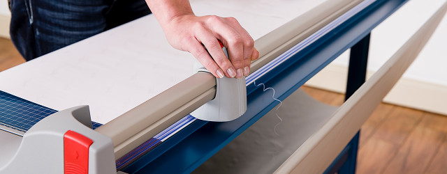 Large format rotary trimmers offer precision and control for oversized banners, posters, and photos.