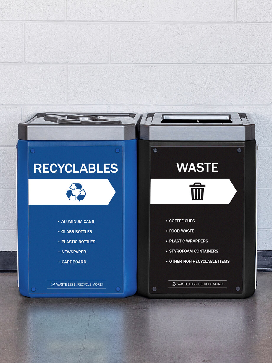 large capacity blue and black recycling and waste bins with brushed pewter effect lids including large body signs in a sports stadium
