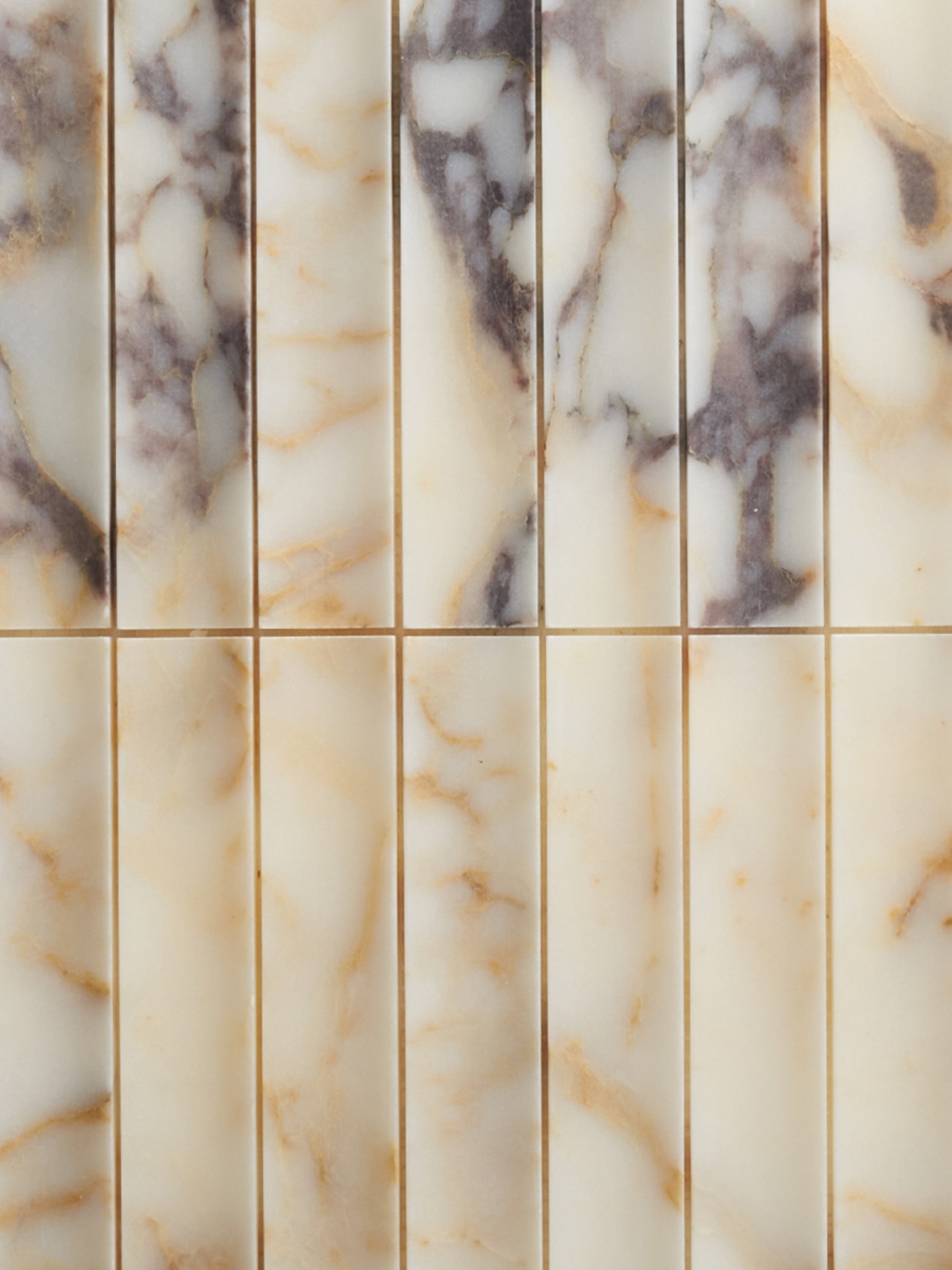 a close up of a marble wall.