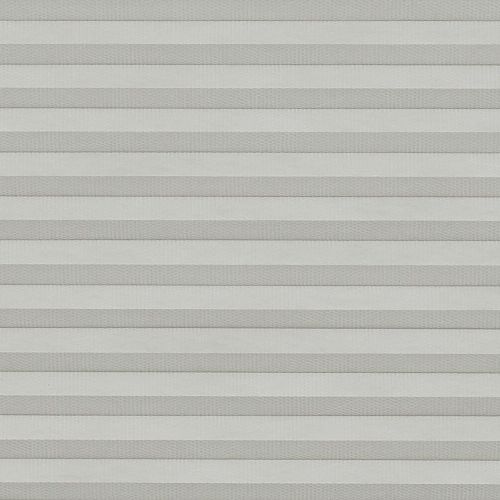 Light-gray pleated cellular blinds, lowered and fully closed, diffusing soft daylight; covering a window in a neutral, evenly lit interior with no outside view visible.