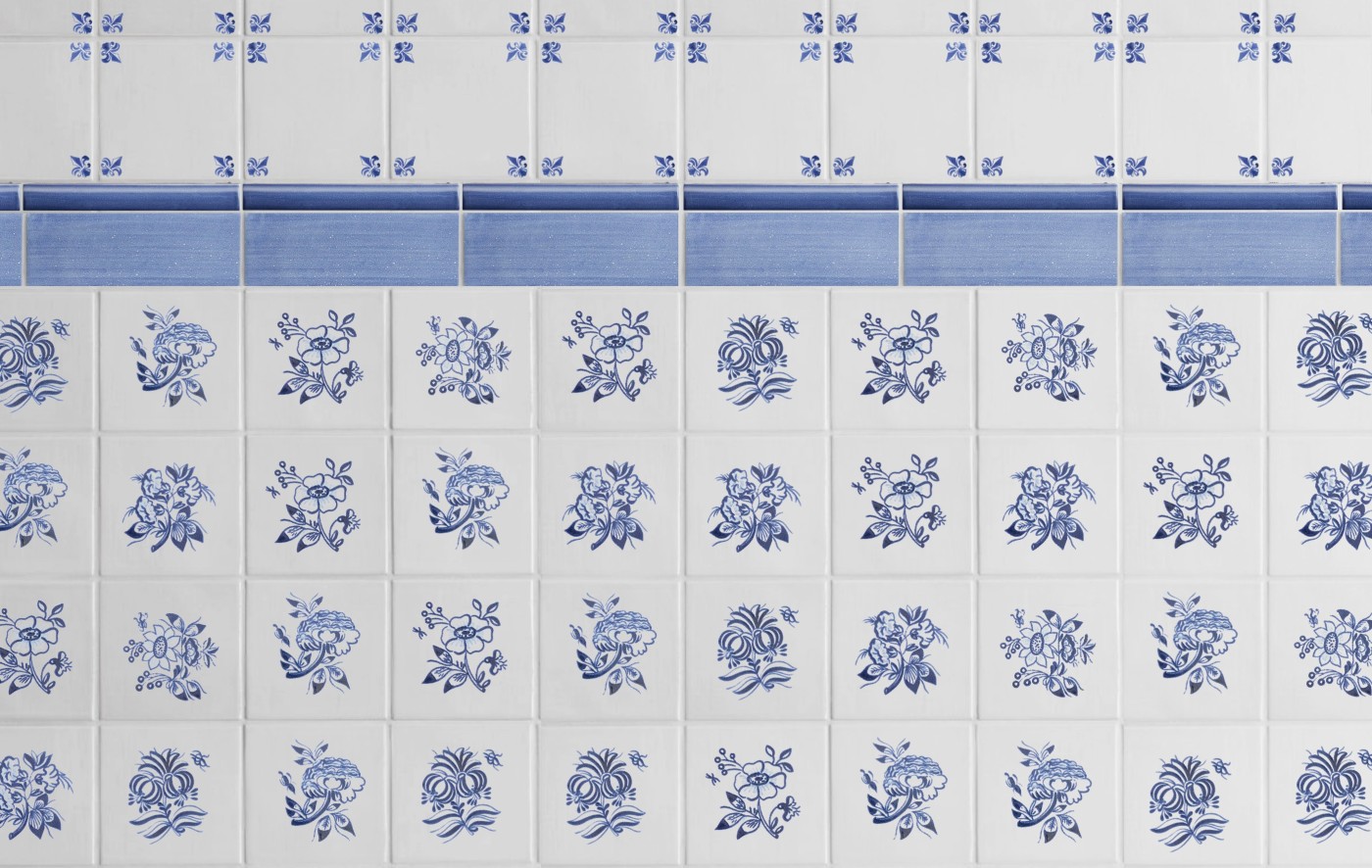 blue and white tiles with floral designs on them.