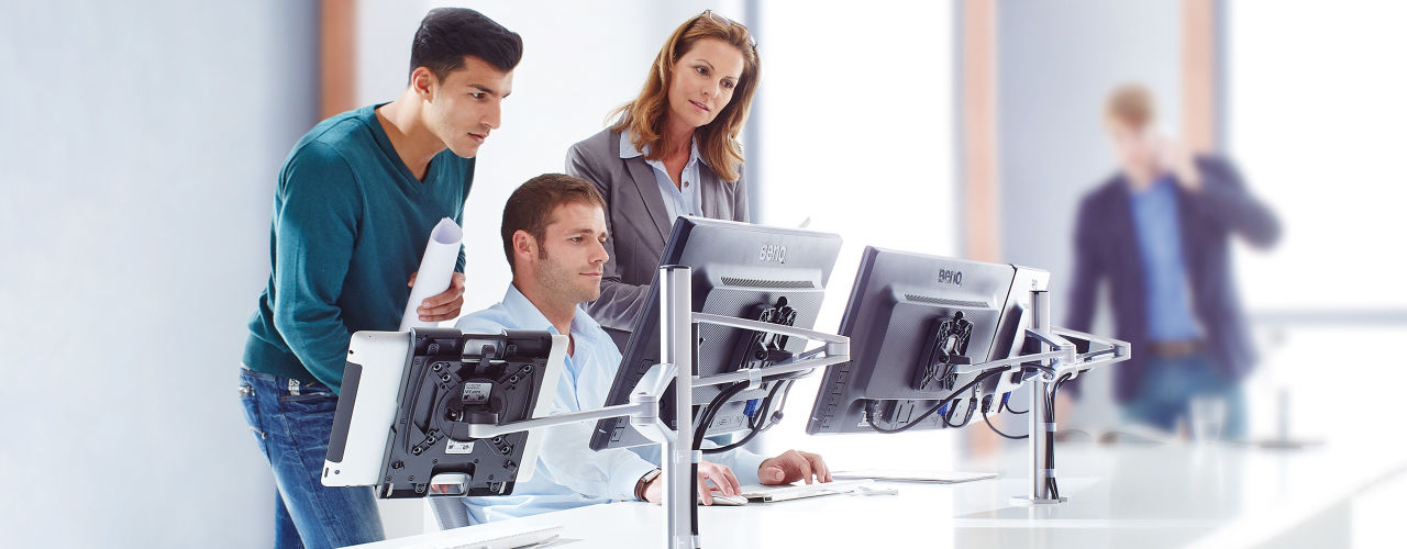 Novus Monitor Arms are highly adjustable, save space by elevating monitors off the work surface, and offer a variety of models to suit any work environment.