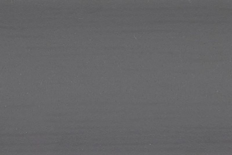 Gray fabric or paper surface with fine horizontal striations and tiny white specks; flat and static, uniformly lit, filling the frame as a close-up of a neutral textured background.