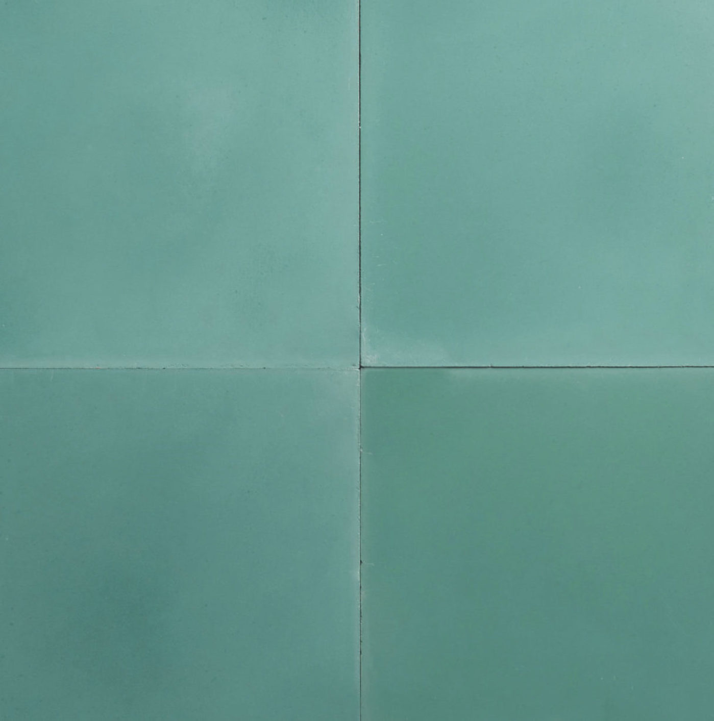 four turquoise colored square tiles.