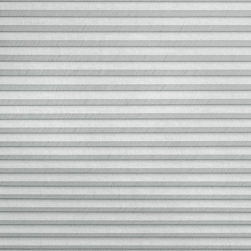 Horizontal pleated (cellular) blind, fully lowered with regular narrow folds and textured fabric, blocking the view and softly diffusing daylight in a neutral, evenly lit interior.
