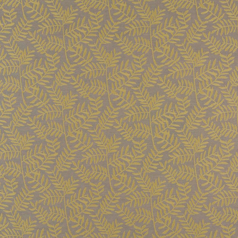 Yellow fern-branch patterned fabric covering the entire view, repeating embroidered motifs on a gray-beige textured background; close-up, evenly lit, decorative wallpaper or upholstery sample.