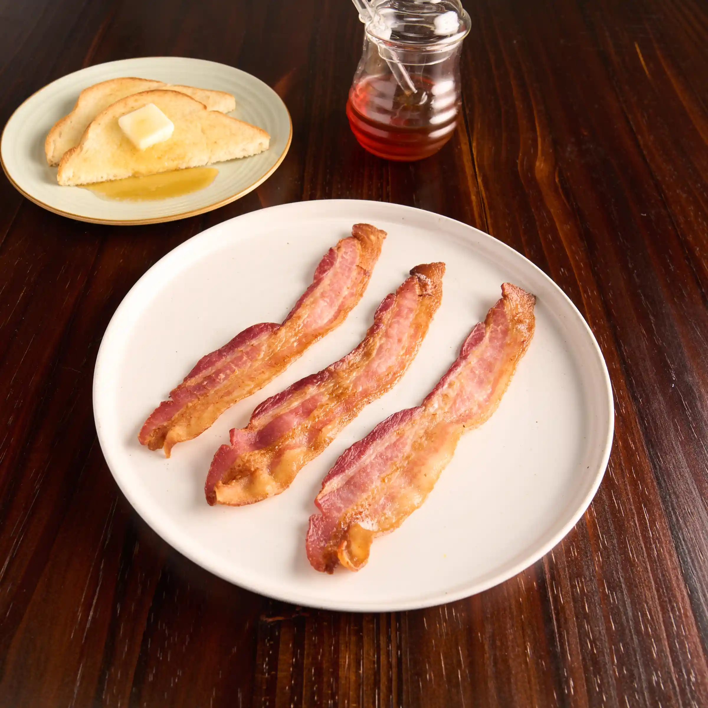 Wright® Brand Hickory Smoked Honey Thick Sliced Flat-Pack® Bacon 10/12 https://images.salsify.com/image/upload/s--Qiac1rtJ--/q_25/d4f828d270dc43898923a7cd6838f2a3b14f2fc5.webp