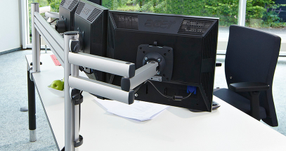 Elevating your monitors creates more useable desk space.