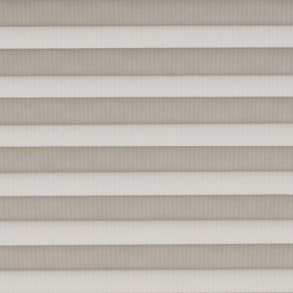 Horizontal pleated cellular shades fully lowered across the window, their alternating light-and-dark bands filtering soft daylight, filling a neutral-toned interior with diffused, even illumination.