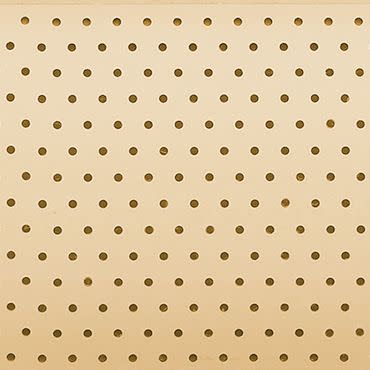 Beige perforated pegboard panel with evenly spaced circular holes fills the frame; static, serving as a plain, neutral backdrop under soft, even lighting.