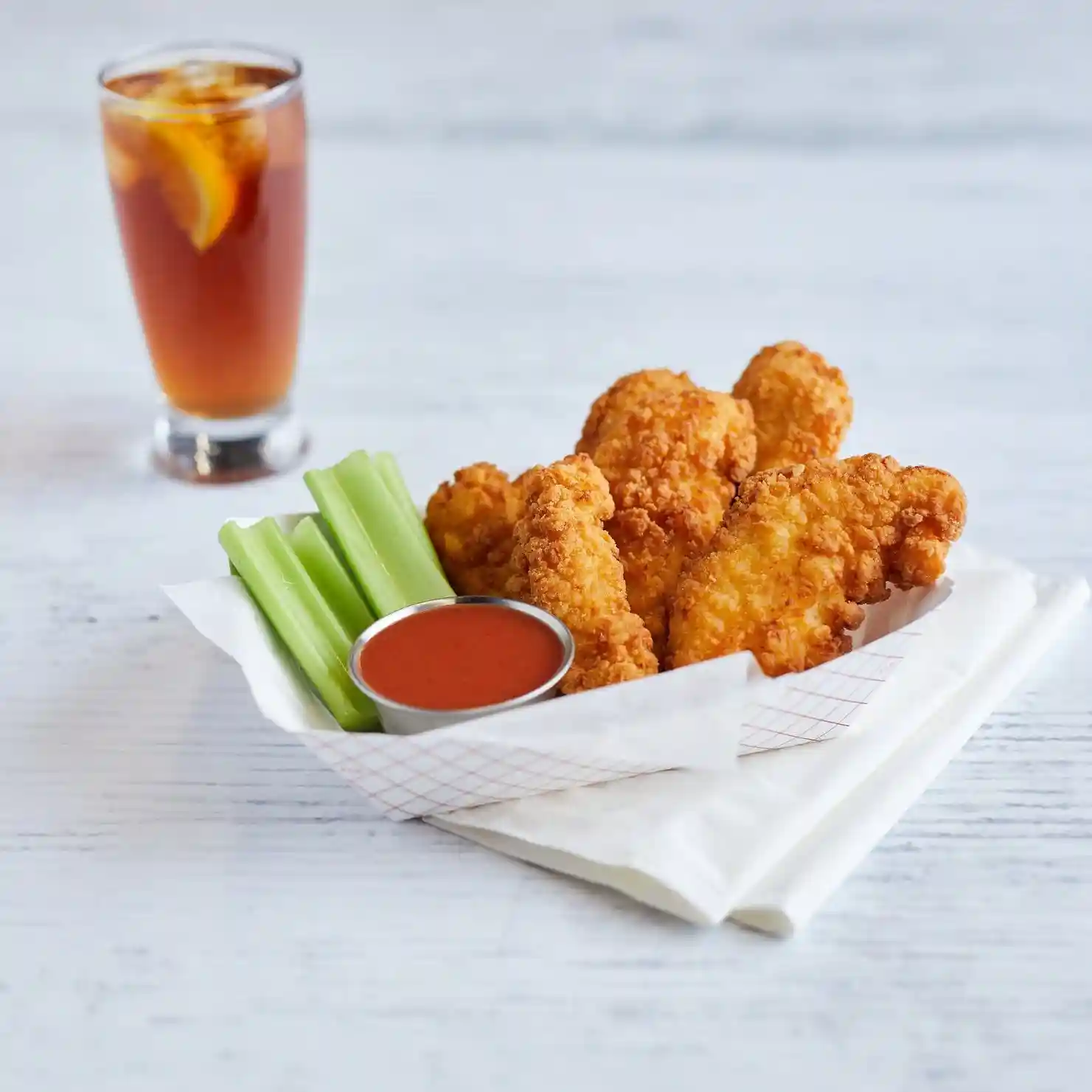 Tyson Red Label® Uncooked Golden Crispy Formed Chicken Tender Fritters https://images.salsify.com/image/upload/s--KFfBaAS8--/q_25/zoofci4wq808x8xtuv4b.webp