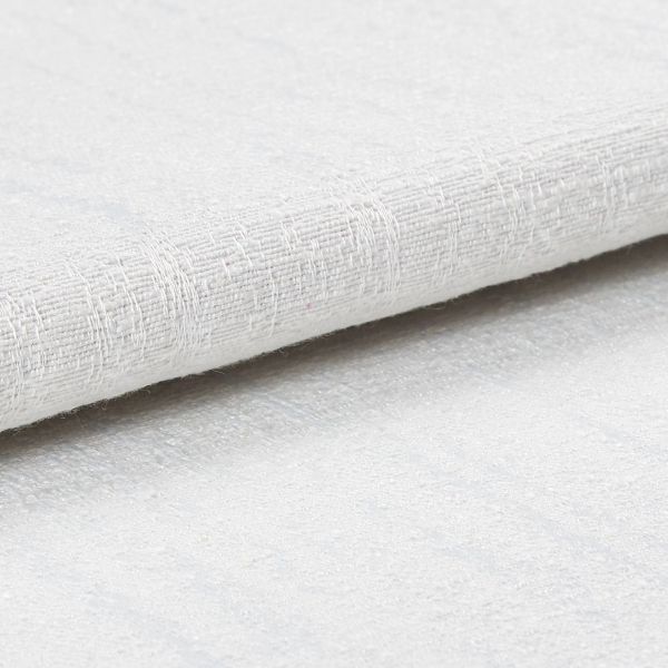 White textured fabric roll with coarse woven pattern; layered and slightly folded, resting overlapped on a matching textured surface in bright, diffuse studio lighting, close-up detail.