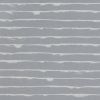 Wallpaper: irregular white horizontal bands run across a muted gray field, forming a repetitive, slightly textured pattern on a flat wall.