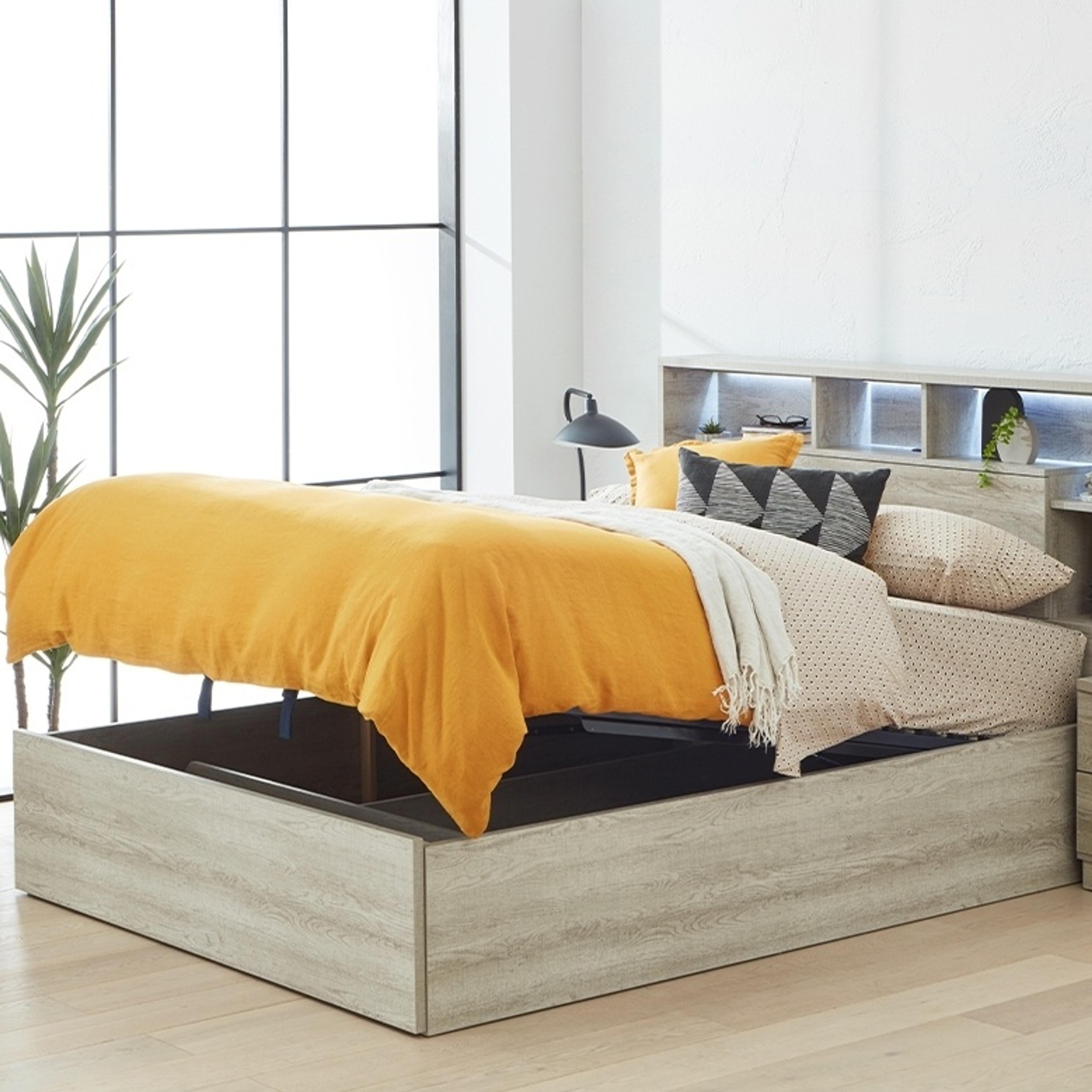 Lifestyle image of the  Argo Bed Frame, Gas Lift & End Drawer Base, Rustic Ash from Forty Winks