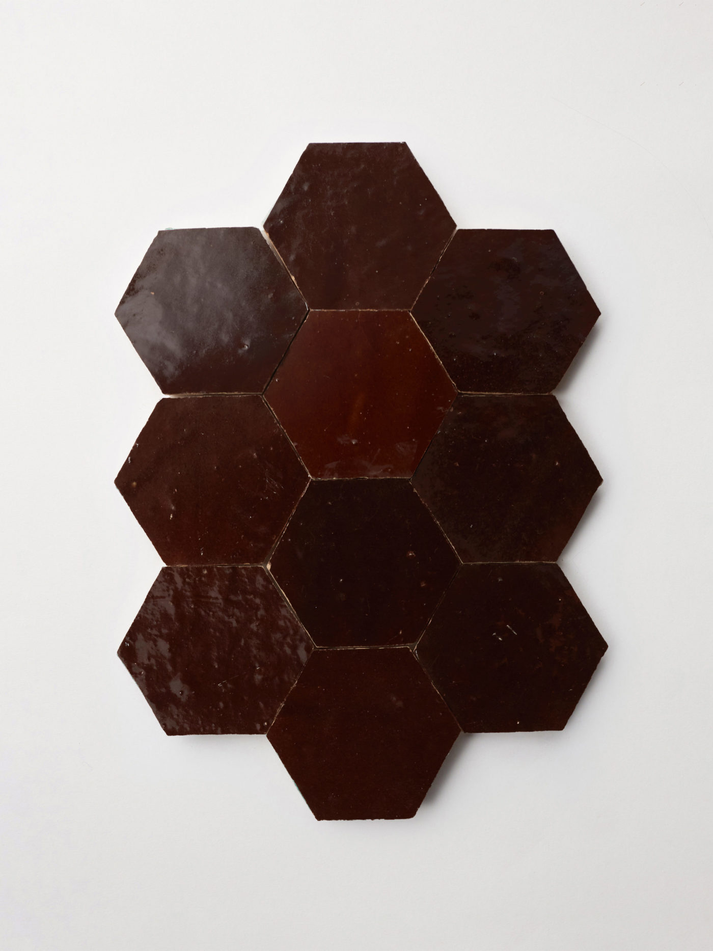 brown hexagonal tiles arranged on a white background.