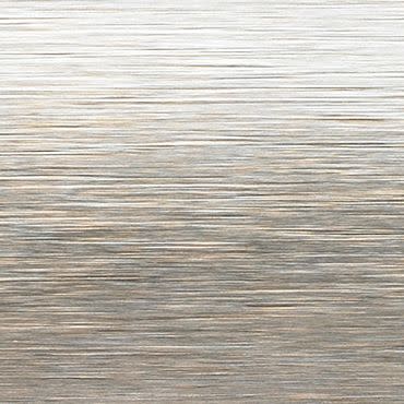 Brushed metal surface with fine horizontal striations, reflecting soft, cool light; serving as a neutral, textured backdrop in an evenly lit, unobtrusive setting.