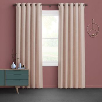 Beige grommet-top curtains hung from a metal rod, drawn slightly apart to filter bright daylight through a central window; muted rose walls, teal mid-century sideboard, circular wall sconce.