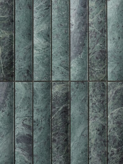 a close up of a green marble tile.