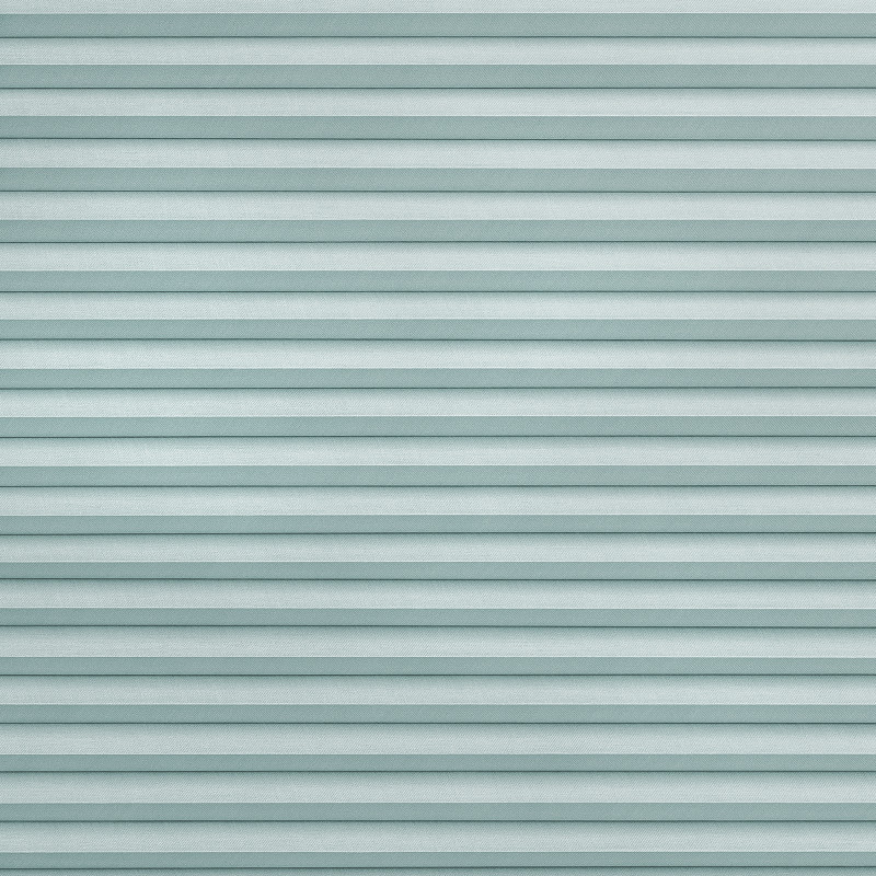 Light-teal pleated cellular blinds covering entire frame, horizontal narrow folds and textured fabric; closed, evenly filtering diffuse cool light; minimal interior context, no visible window or furnishings.