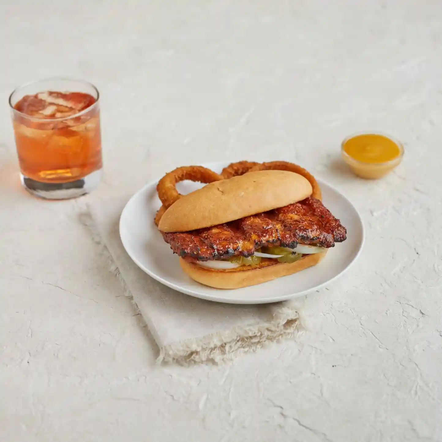 AdvancePierre™ Fully Cooked, Flamebroiled, Boneless Rib Shaped Pork Patties Topped with BBQ Sauce https://images.salsify.com/image/upload/s--r3mYdUXU--/q_25/b1mmfxifbzcavj0oesfp.webp