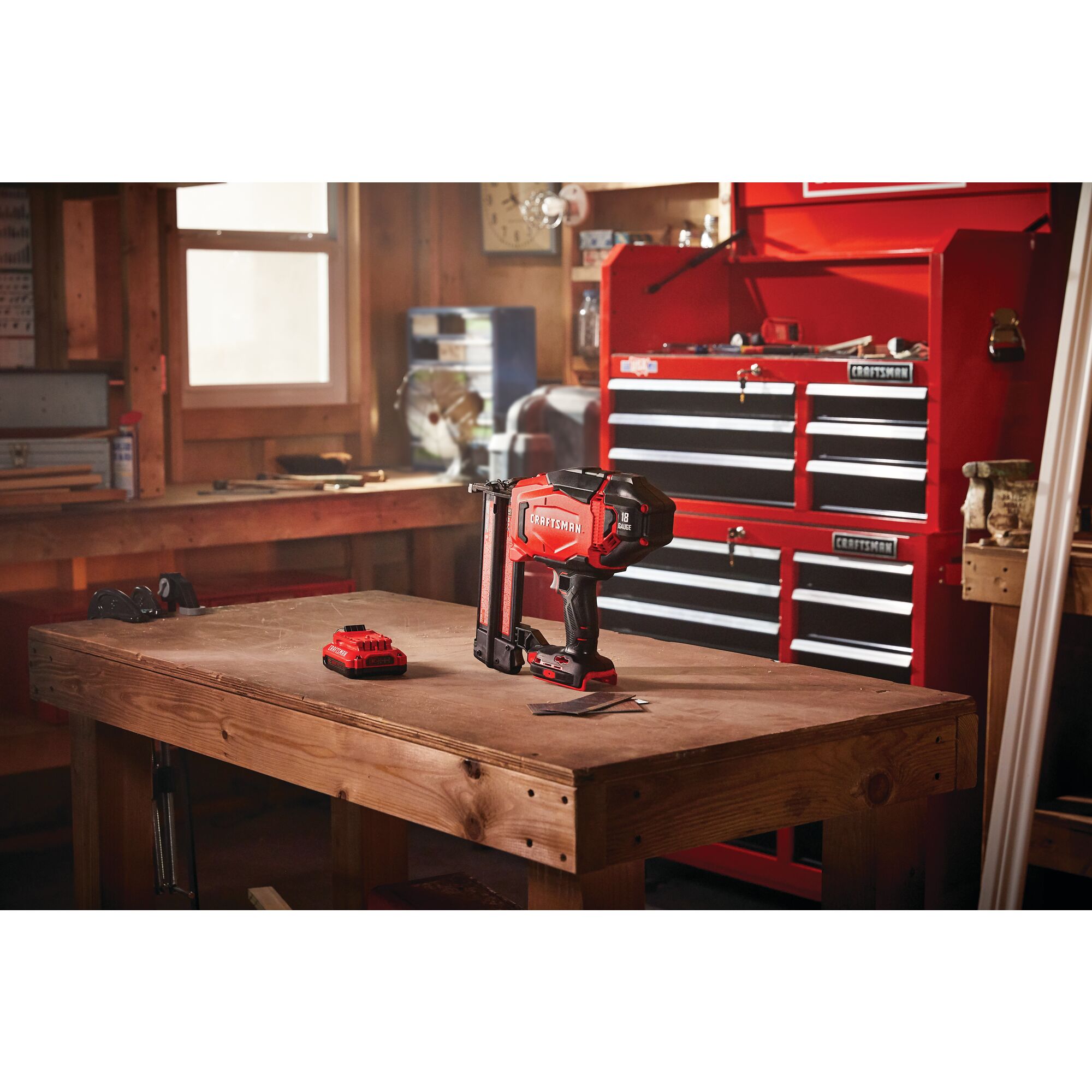20 volt 18 gauge cordless brad nailer placed on a wooden table.