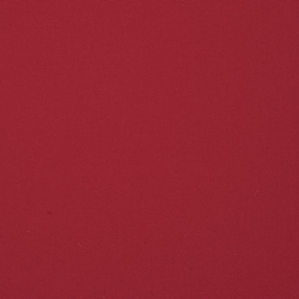 Solid burgundy fabric, stretched flat across the frame, fills the view with uniform lighting and a subtle woven texture showing tiny fibers.