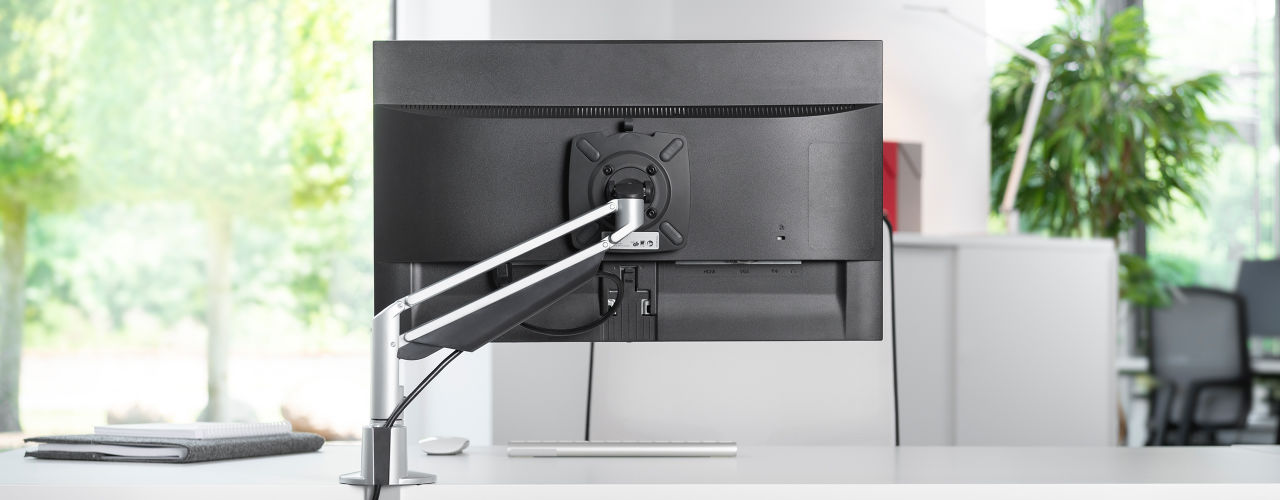 Elevate monitors and tablets to maximize usable space.