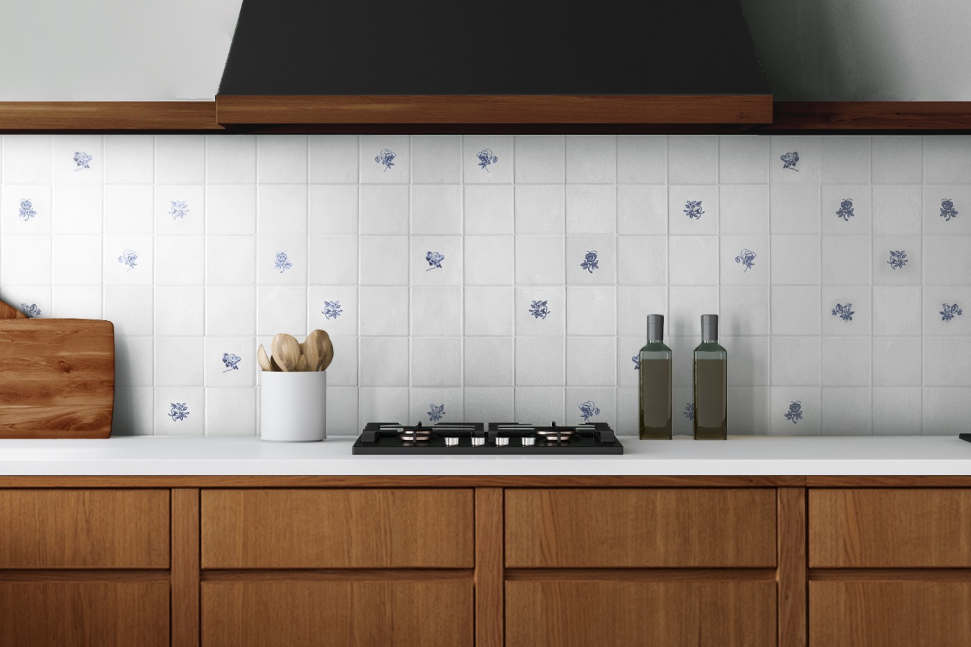 a kitchen with wooden drawers and a blue and white tiled stove backsplash.