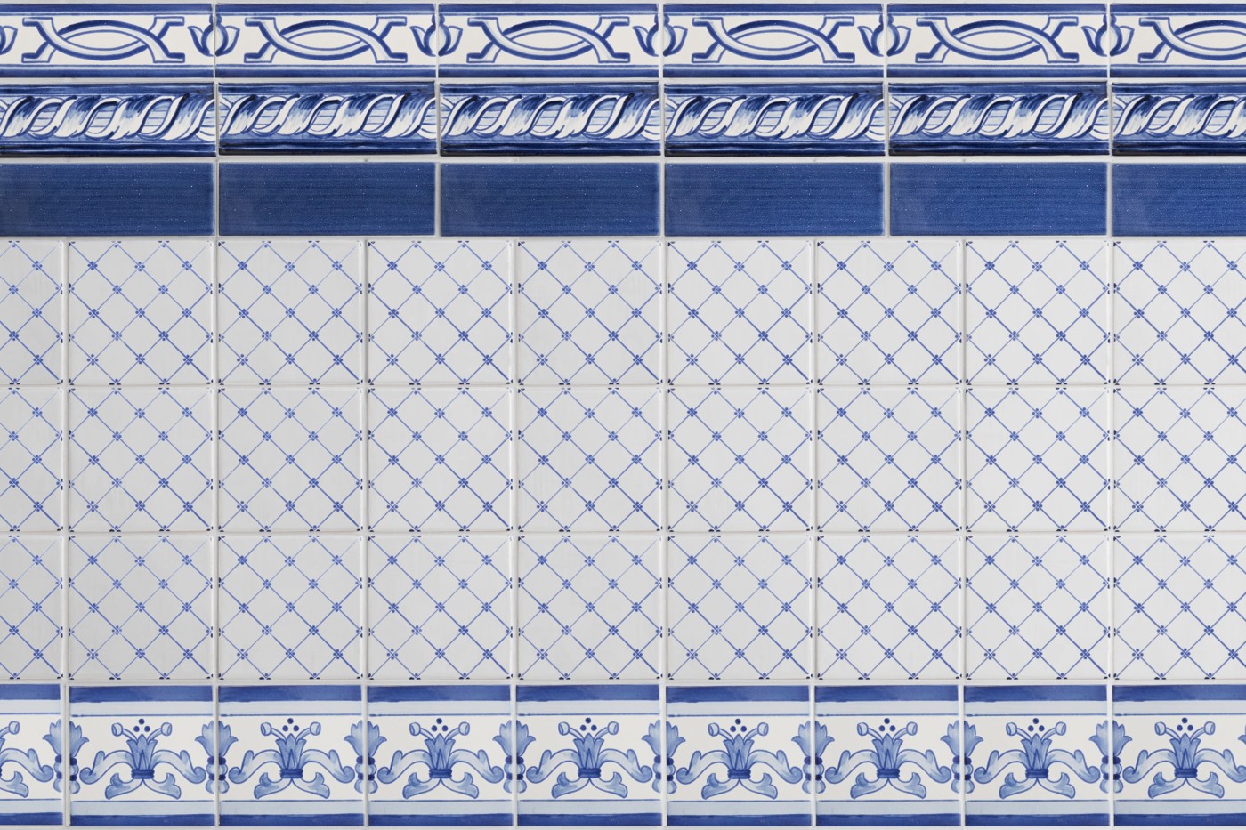 a blue and white tiled wall with decorative designs.