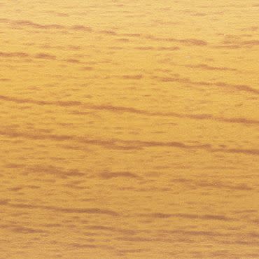 Close-up of a golden-toned horizontal wood-grain surface, displaying subtle darker striations; static, evenly lit and tightly framed with no other objects or visible depth cues.