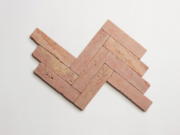 lapidary: girata | cigar | red travertine | tumbled 