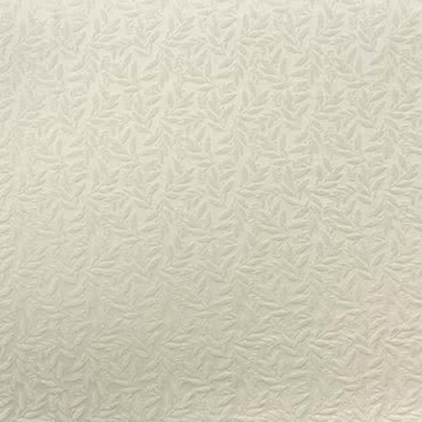 Embossed cream wallpaper with a repeating small leaf-like raised pattern covers a wall, casting subtle shadows in a softly lit, neutral-toned interior.