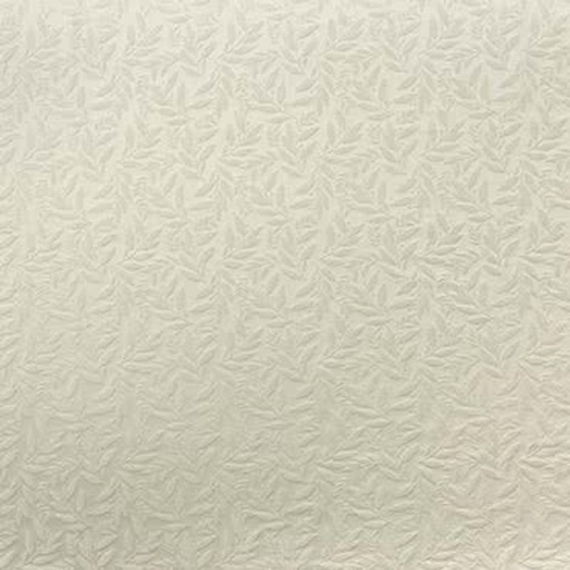 Embossed cream wallpaper with a repeating small leaf-like raised pattern covers a wall, casting subtle shadows in a softly lit, neutral-toned interior.