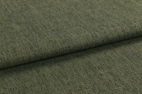 Olive-green textured upholstery fabric, folded once creating an overlapping edge; tightly woven, slightly napped surface; photographed in a close-up, evenly lit studio setting emphasizing texture.