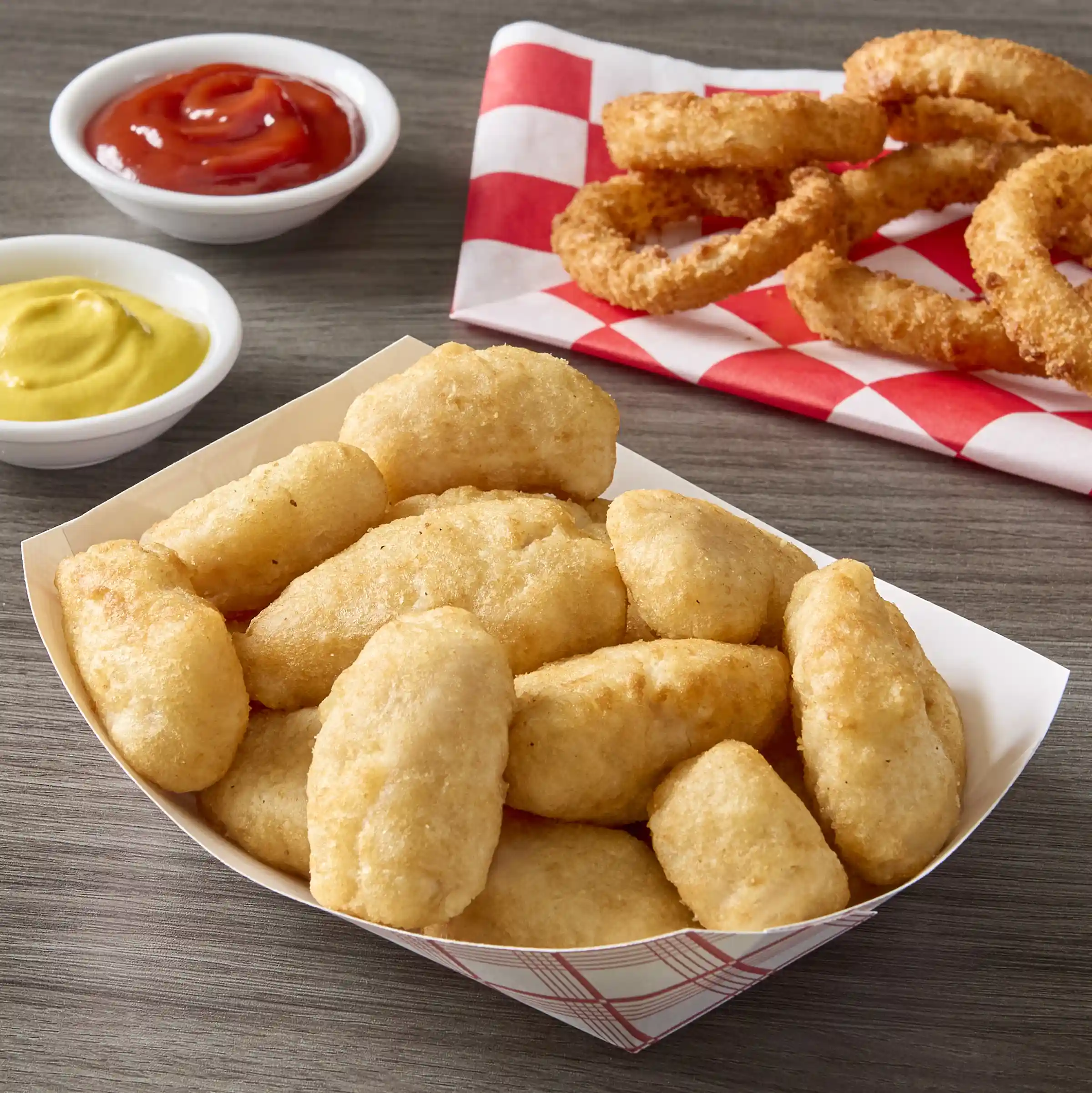 Tyson® Uncooked Battered Boneless Skinless Cubed Chicken Breast Fritters_image_1