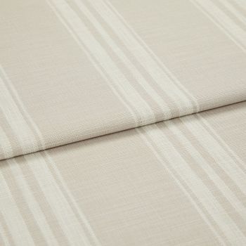 Beige-and-cream striped fabric, folded in layered horizontal pleats; woven texture visible; close-up view with soft, diffuse lighting on a neutral surface.