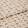 Woven upholstery fabric, beige and taupe geometric lattice with octagonal motifs, folded over itself; lying flat to show texture and pattern in a close-up studio product shot with soft lighting.