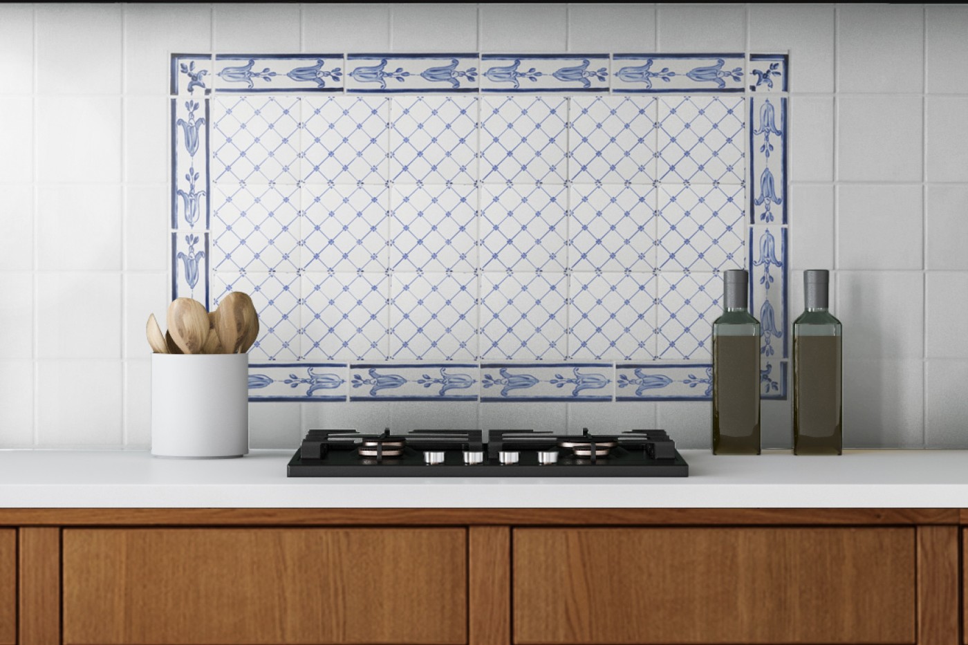 a blue and white tiled stove backsplash in a kitchen.