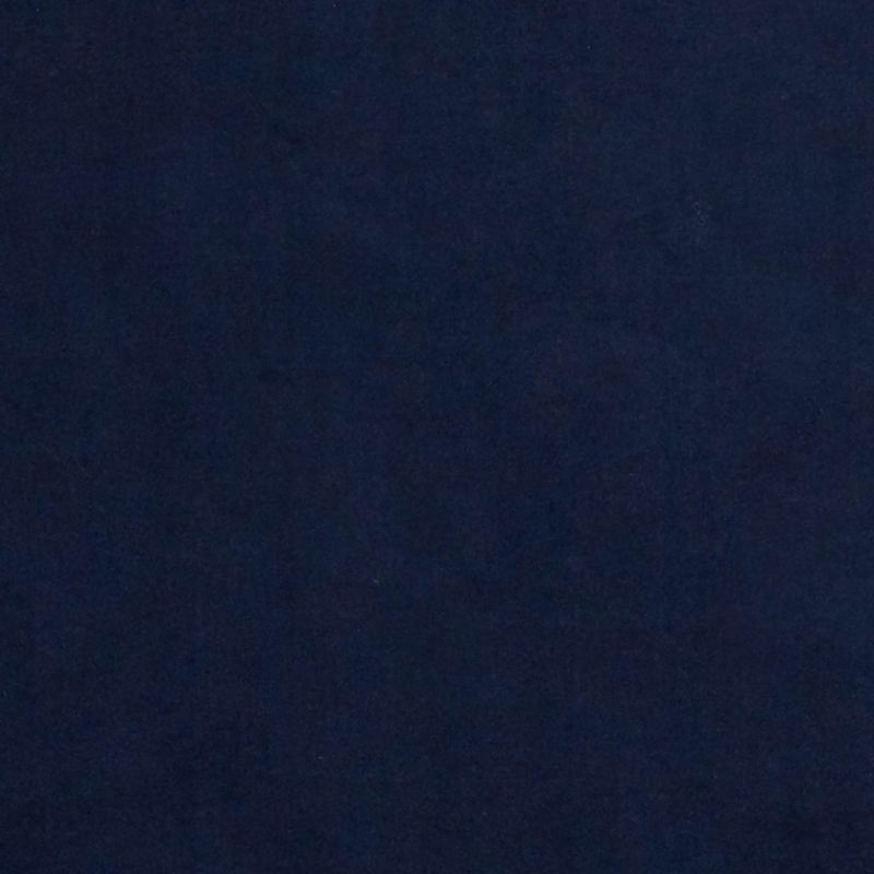 Navy-blue fabric panel fills the entire frame, appearing stretched and smooth; it uniformly absorbs light, creating a dim, evenly lit background with subtle textile texture and no visible features.
