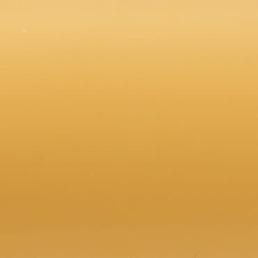 Plain ochre-gold painted wallâ€”smooth, slightly texturedâ€”filling the frame; evenly lit with a soft top-to-bottom gradient; close-up, minimal composition without discernible objects or shadows.