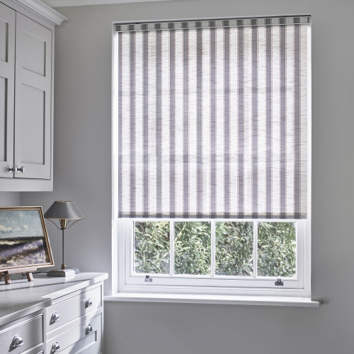 Tide Denim Roller Blind from Calm Living collection with grey and white stripes in a modern kitchen window.