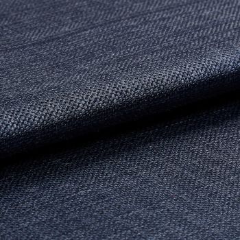 Dark navy woven fabric, tightly woven and folded over itself; its textured basket weave catches a subtle sheen, shown in a close-up macro view with soft, even lighting.