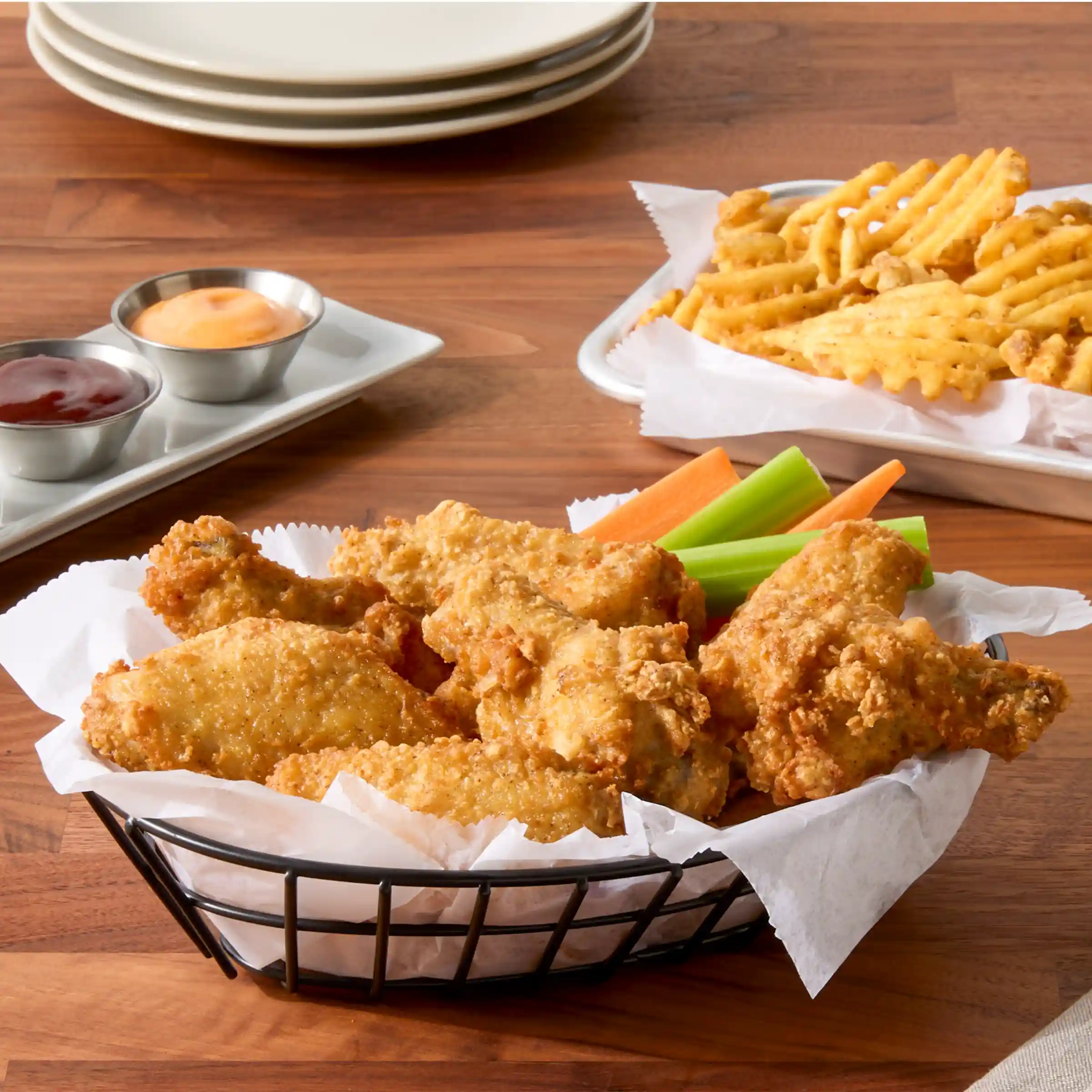Tyson® Honey Stung® Fully Cooked Lightly Breaded Original Honey Bone-In Chicken Wing Sections, Jumbo https://images.salsify.com/image/upload/s--gBYvzO48--/q_25/bzyjkqzuyovbrqybqfvr.webp