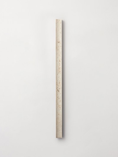 a piece of wood on a white wall.