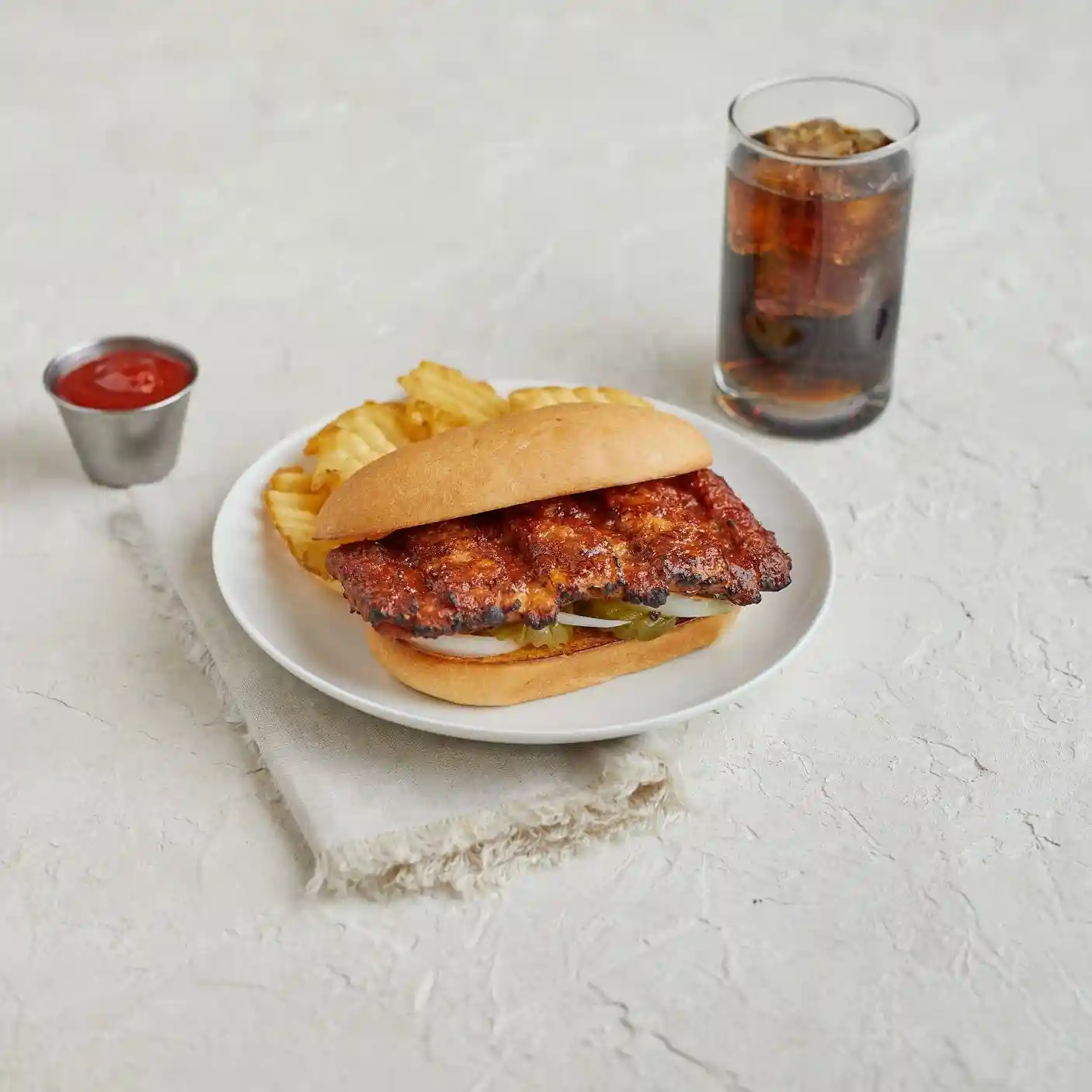 RIB-B-Q® Boneless Pork Rib Patty with BBQ Sauce https://images.salsify.com/image/upload/s--dTyl_uCA--/q_25/lgyqsstimc77sblo4hzd.webp