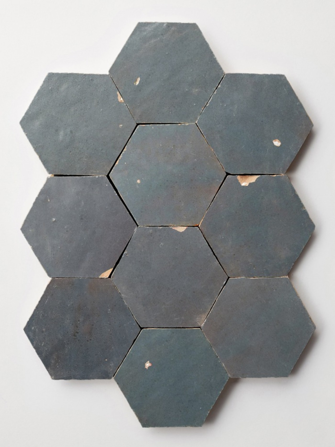 hexagonal tiles on a white surface.