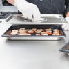 Half-size 1 ¼-inch-deep Super Pan V® stainless steel steam table pan with Steel Coat x3™ nonstick coating