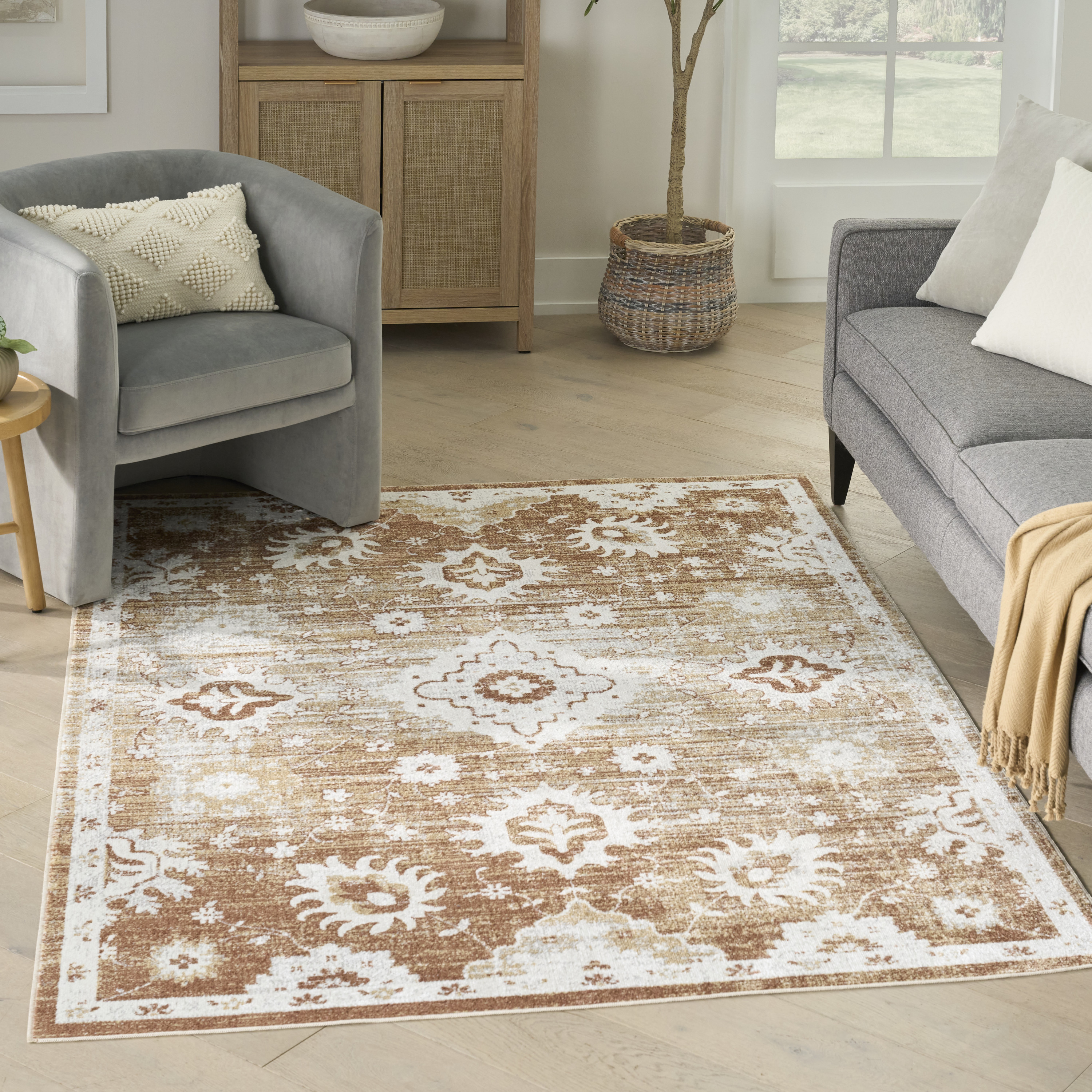 Nourison Astra Machine Washable 5'3" x 7' Copper Vintage Indoor Rug